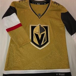 Vegas Knights NHL hockey jersey. Gold and black